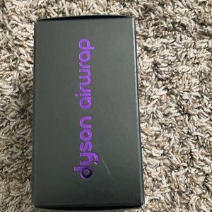 Two Dyson 1.2” black and purple airwrap barrels